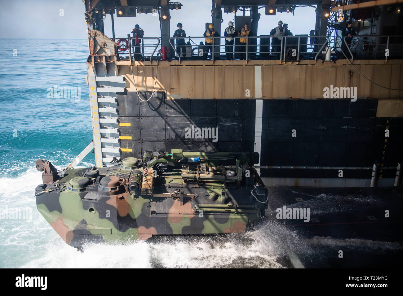 190329-N-HD110-0100  PACIFIC OCEAN (March 29, 2019) An assault amphibious vehicle attached to Battalion Landing Team 3rd Battalion, 5th Marine Regiment, 11th Marine Expeditionary Unit exits the well deck of the Harpers Ferry-class amphibious dock landing ship USS Harpers Ferry (LSD 49). Harpers Ferry is underway conducting routine operations as a part of USS Boxer Amphibious Ready Group (ARG) in the eastern Pacific Ocean. (U.S. Navy photo by Mass Communication Specialist 3rd Class Danielle A. Baker) Stock Photo
