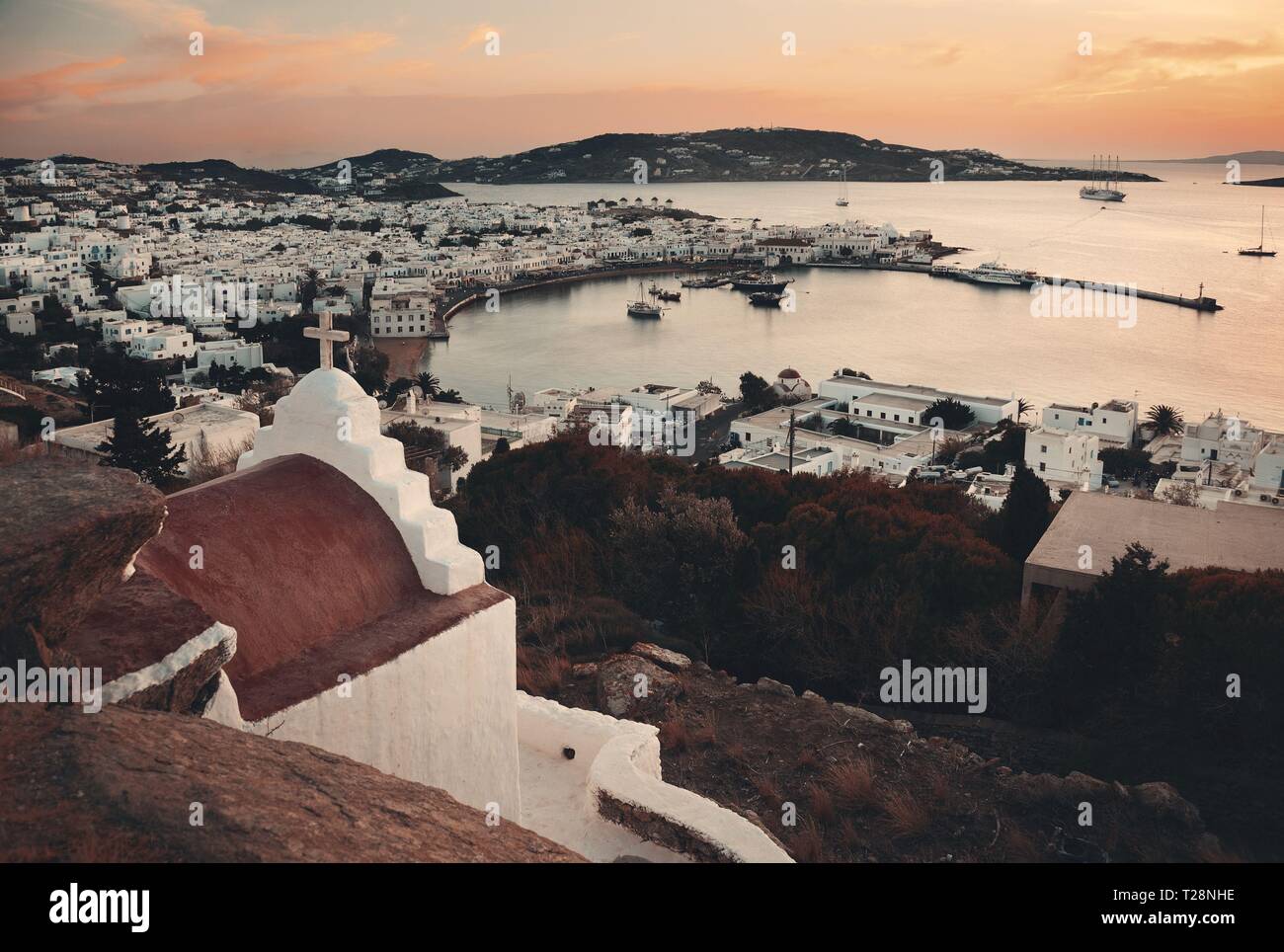 Mykonos bay viewed from above at sunset. Greece. Stock Photo