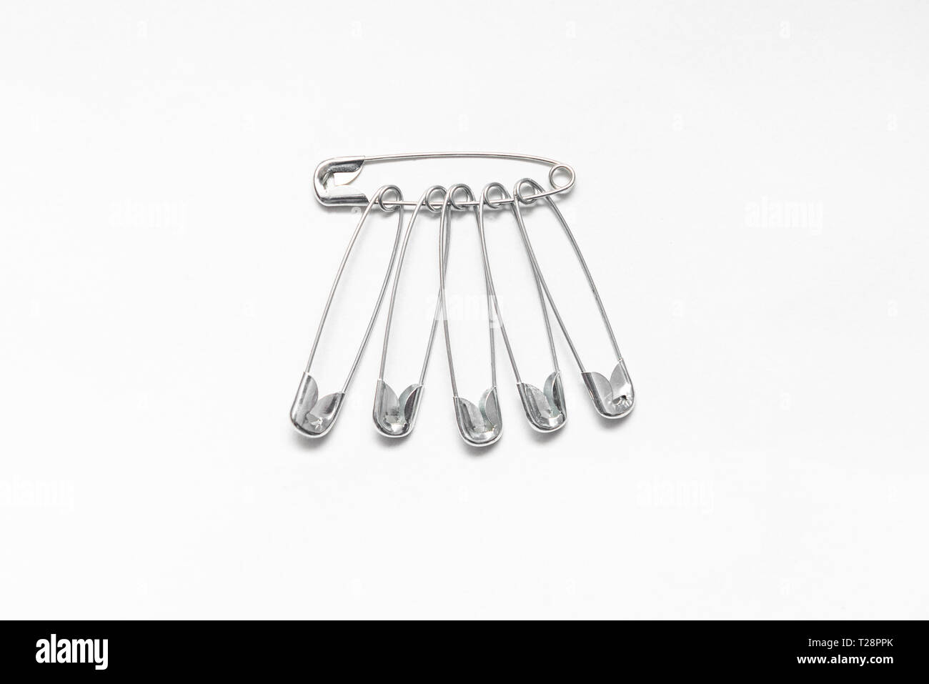 safety pin arrangement Stock Photo Alamy