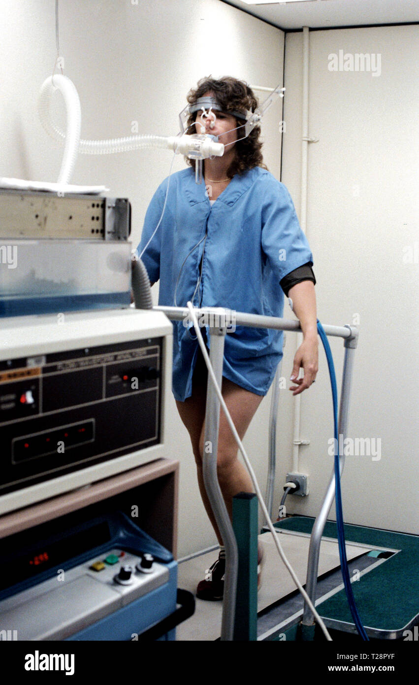 8-12 July 1985) -- Sharon C. (Christa) McAuliffe of Concord High, Concord, New Hampshire, runs in place on treadmill to test physiological responses at Johnson Space Center Stock Photo