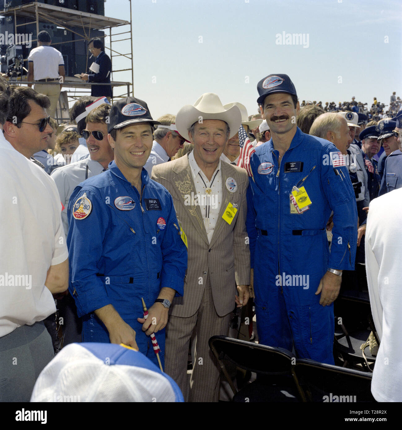 (4 July 1982) --- Inveterate space fan Roy Rogers with astronauts Jerry L. Ross, left, and Guy S. Gardner at Edwards Air Force Base for the landing of the space shuttle Columbia at the conclusion of the STS-4 Stock Photo