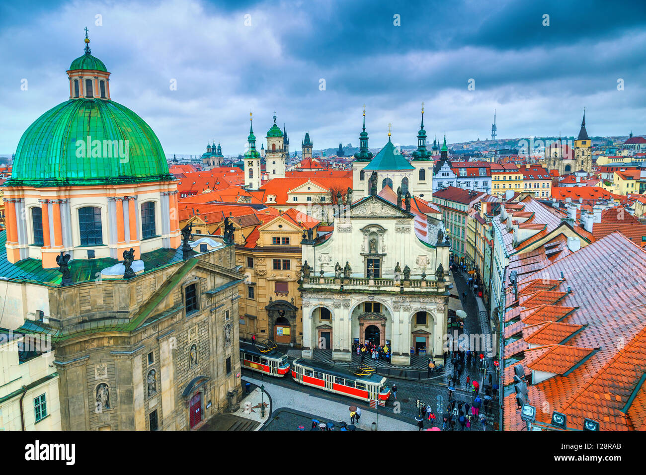 Wonderful travel destination and touristic place. Stunning old town panorama with famous towers and red tram in the best touristic town, Prague, Czech Stock Photo