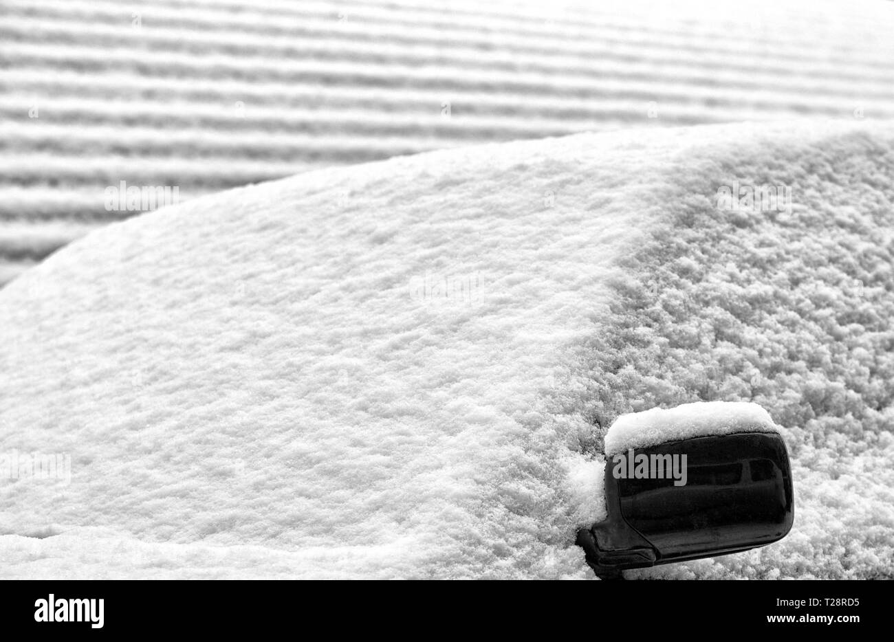 Fresh snow on windscreen background Stock Photo - Alamy