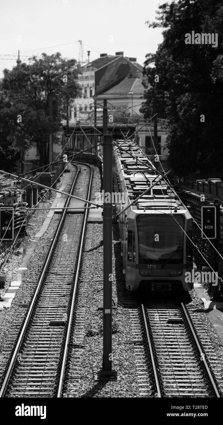 Subway Train Outdoors Passing By Train Station Stock Photo