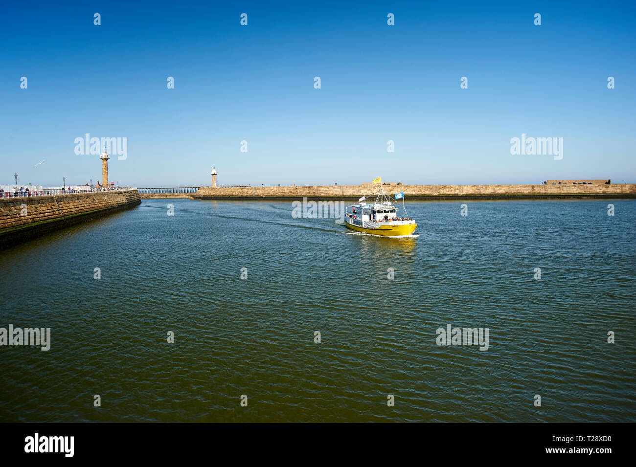 The Summer Queen boat entering the harbour at Whitby , North Yorkshire ...