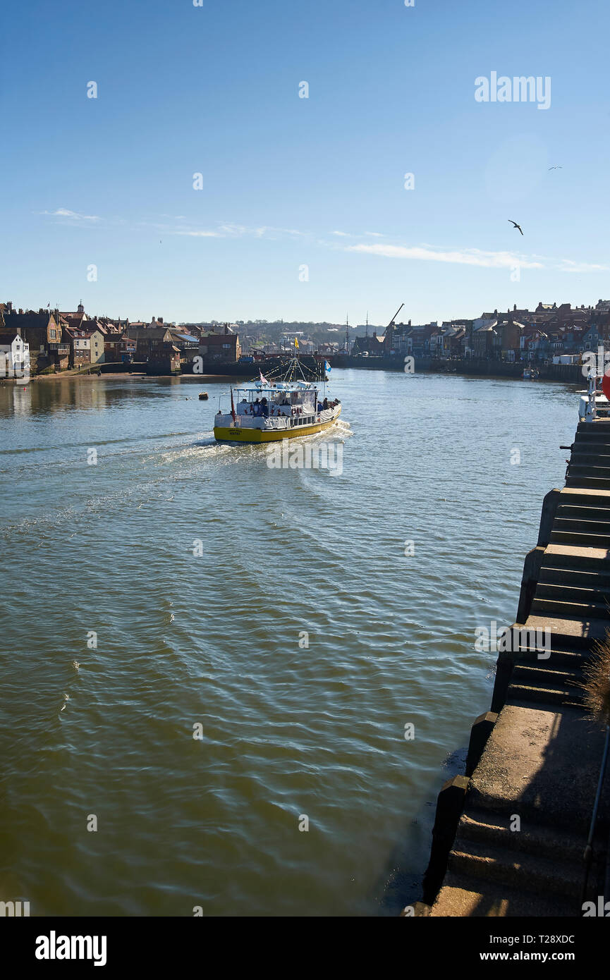 The Summer Queen boat entering the harbour at Whitby , North Yorkshire ...