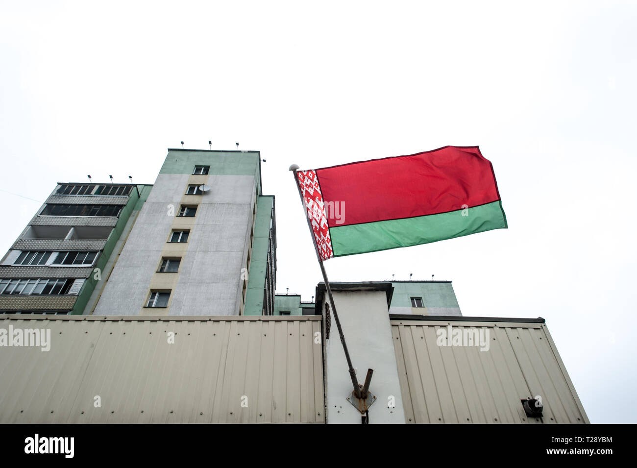 The flag of the Republic of Belarus flies on a building in Minsk. Stock Photo