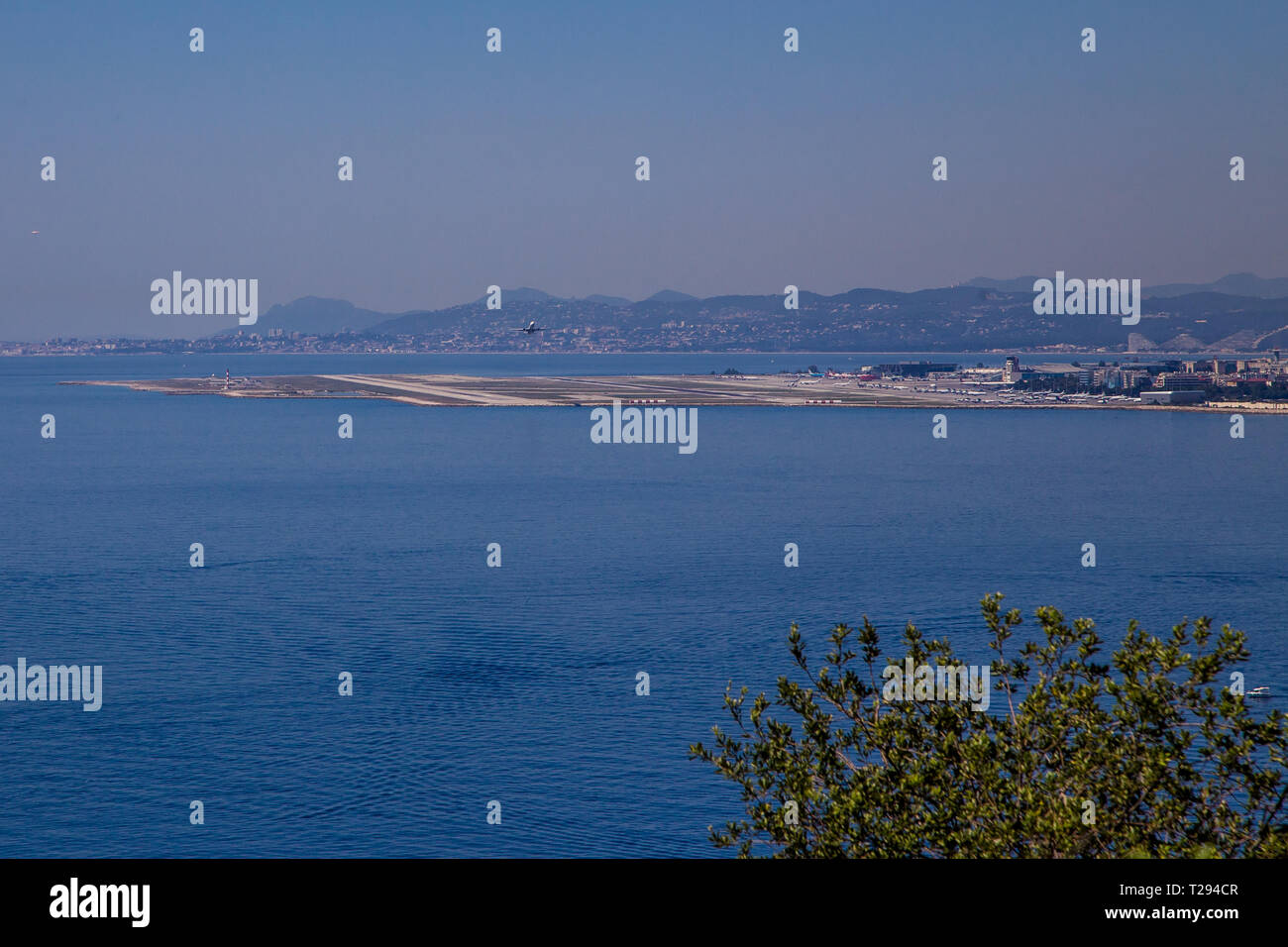 A plane takes off from Nice Côte d'Azur Airport ICAO LFMN Stock Photo