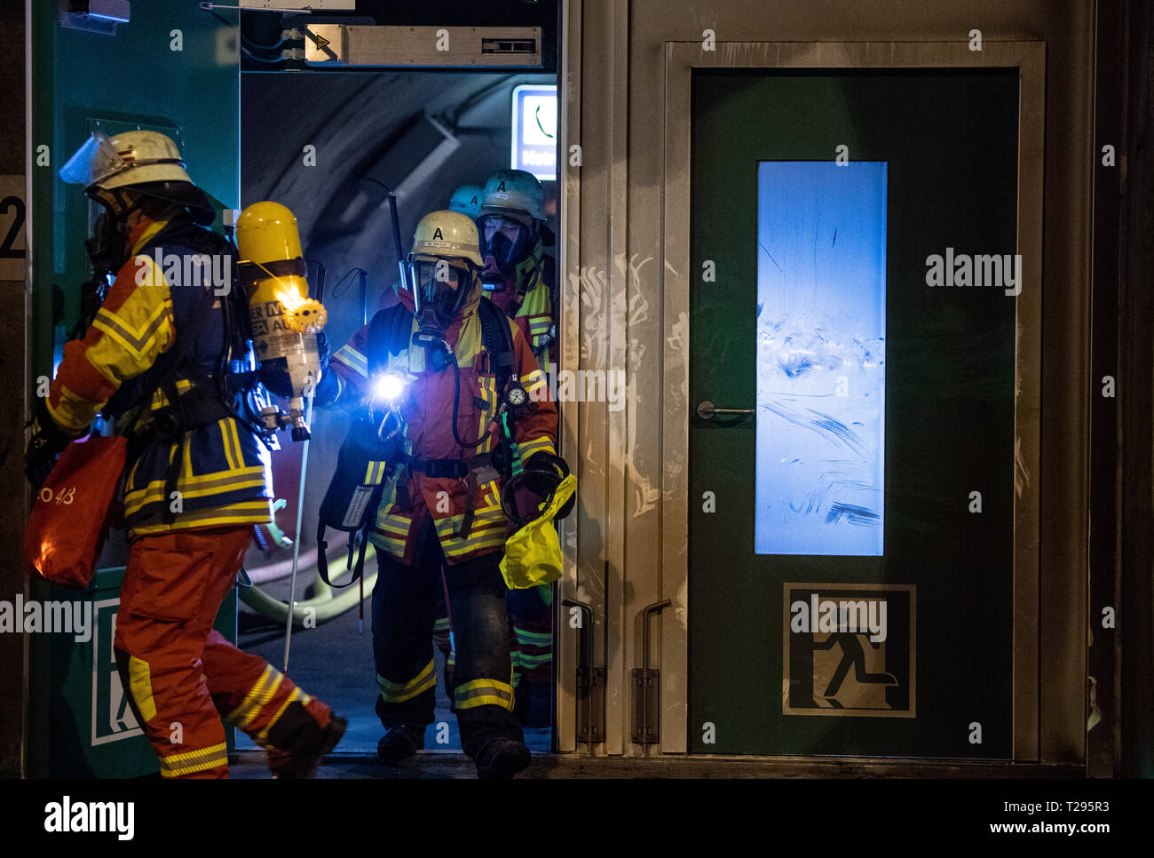 Leonberg, Germany. 31st Mar, 2019. During a disaster control exercise in the Engelberg Tunnel, emergency forces pass through a side entrance. The exercise was carried out with about 400 emergency personnel. Credit: Fabian Sommer/dpa/Alamy Live News Stock Photo