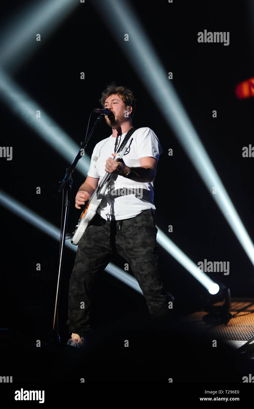 London, UK. 30th March 2019. James Bourne of Rock band Busted seen performing live on stage during their Halfway there tour 2019 at Wembley SSE Arena London. Credit: SOPA Images Limited/Alamy Live News Stock Photo