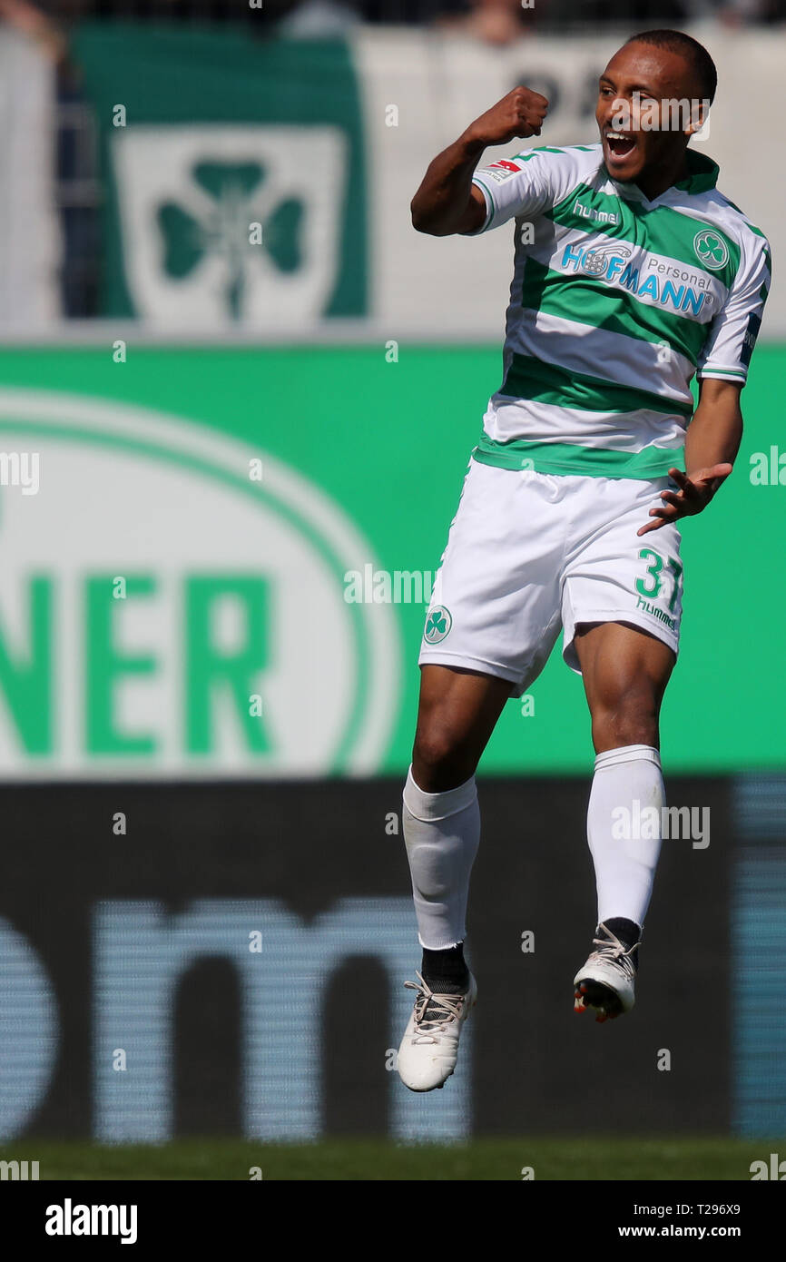 Furth, Germany. 31st Mar, 2019. Soccer: 2nd Bundesliga, SpVgg Greuther Fürth - Arminia Bielefeld, 27th matchday, at the Sportpark Ronhof Thomas Sommer. The Fürther Julian Green cheers about his goal to 1-0. Photo: Daniel Karmann/dpa - IMPORTANT NOTE: In accordance with the requirements of the DFL Deutsche Fußball Liga or the DFB Deutscher Fußball-Bund, it is prohibited to use or have used photographs taken in the stadium and/or the match in the form of sequence images and/or video-like photo sequences. Credit: dpa picture alliance/Alamy Live News Stock Photo