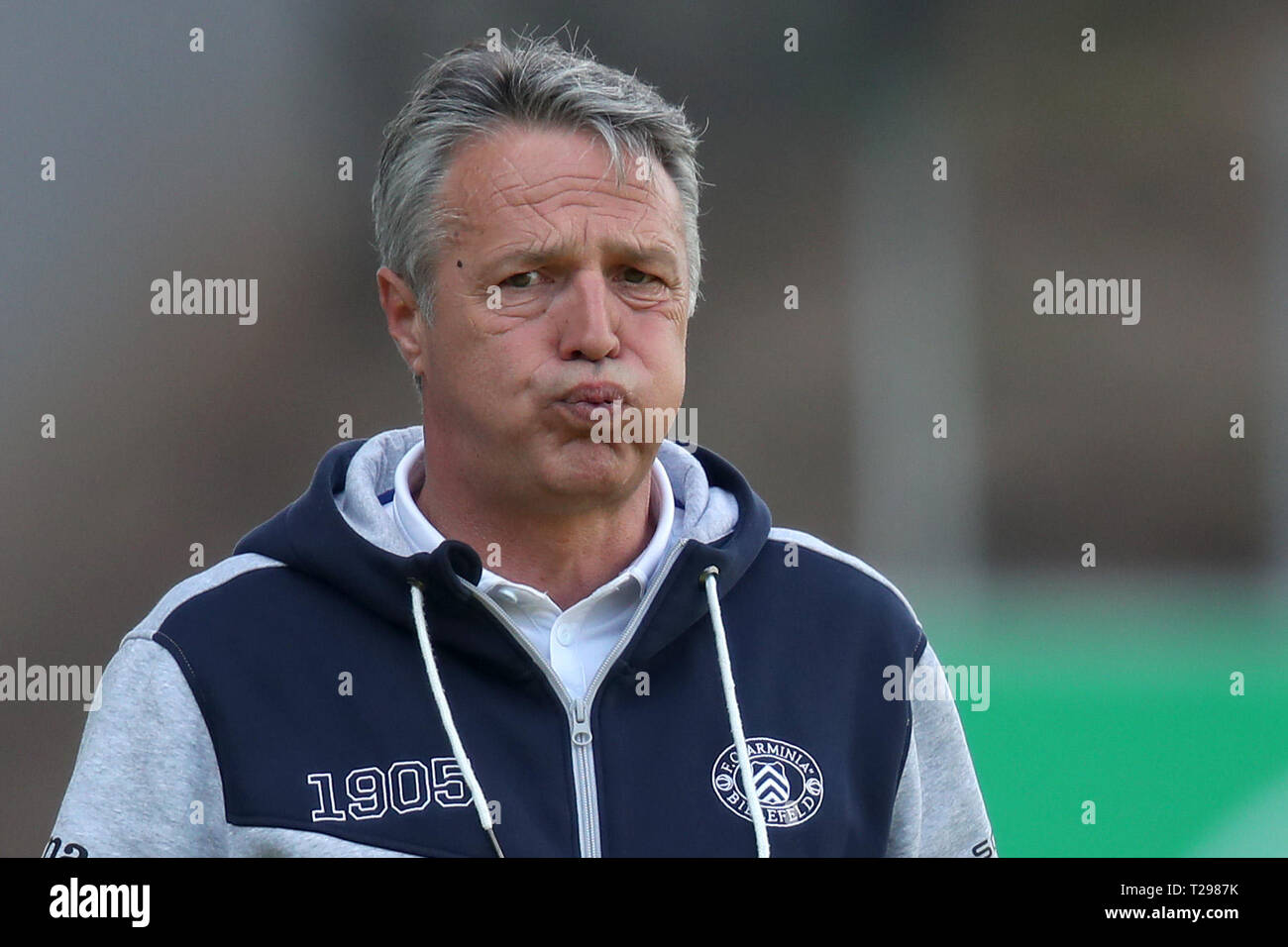 Furth, Germany. 31st Mar, 2019. Soccer: 2nd Bundesliga, SpVgg Greuther Fürth - Arminia Bielefeld, 27th matchday, at the Sportpark Ronhof Thomas Sommer. The Bielefeld coach Uwe Neuhaus blows at the edge of the pitch. Photo: Daniel Karmann/dpa - IMPORTANT NOTE: In accordance with the requirements of the DFL Deutsche Fußball Liga or the DFB Deutscher Fußball-Bund, it is prohibited to use or have used photographs taken in the stadium and/or the match in the form of sequence images and/or video-like photo sequences. Credit: dpa picture alliance/Alamy Live News Stock Photo