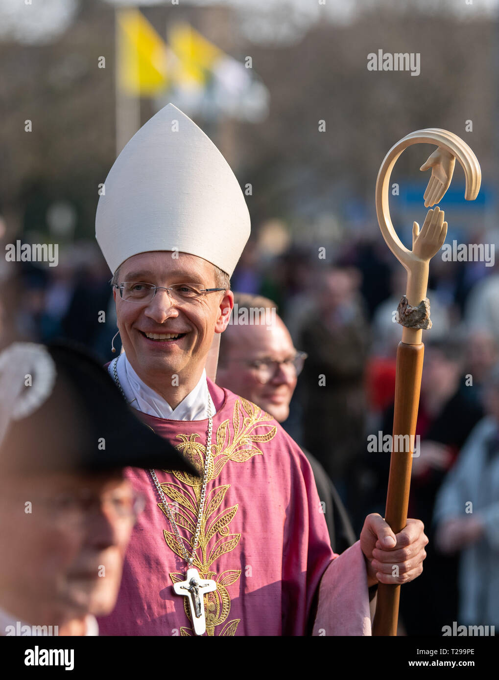 Fulda, Germany. 31st Mar, 2019. Michael Gerber, bishop of Fulda, goes after his solemn inauguration as bishop in front of the cathedral. Gerber (49) succeeds Algermissen and is the youngest bishop of the Catholic Church in Germany. Credit: Silas Stein/dpa/Alamy Live News Stock Photo