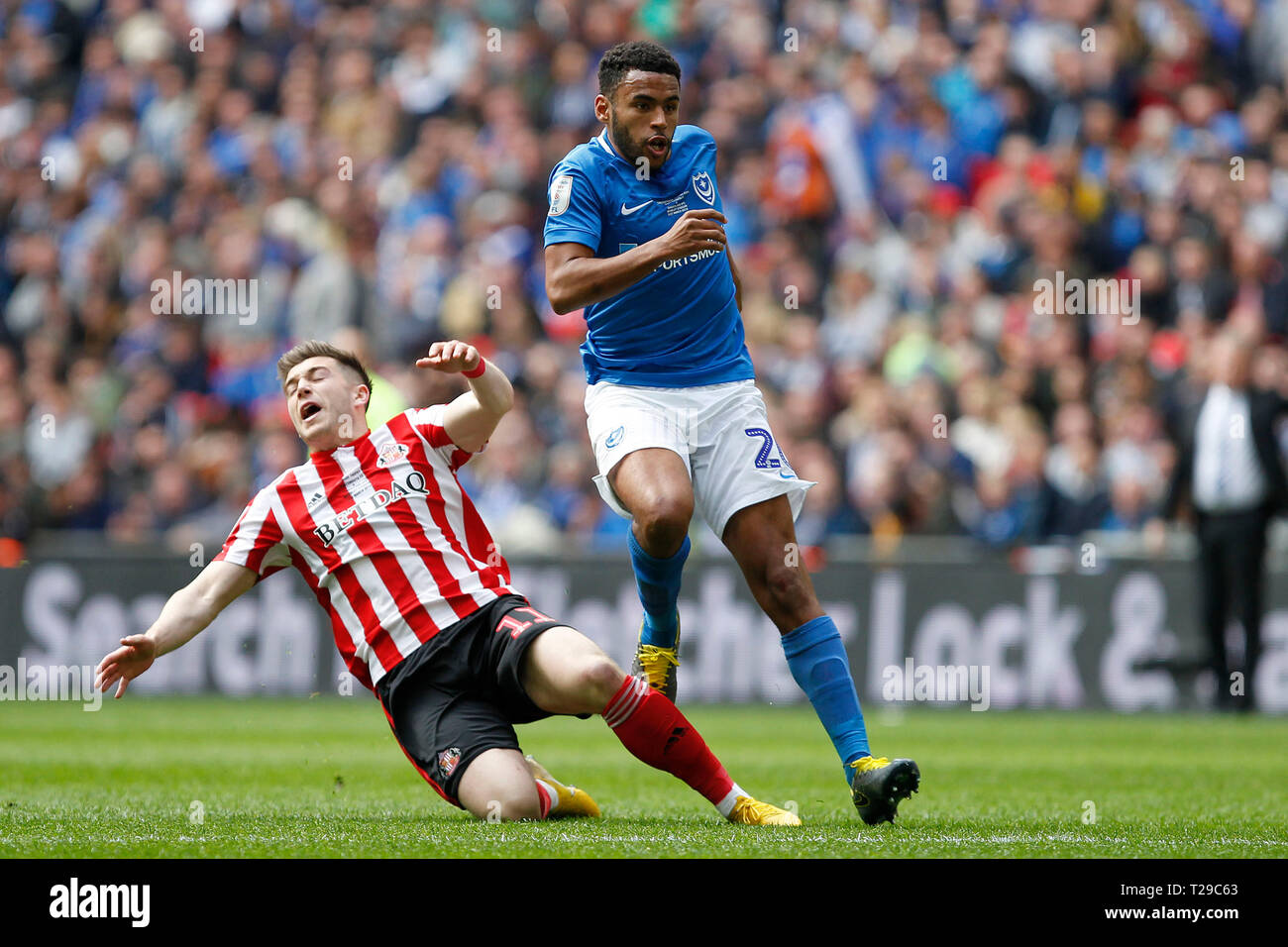 Lynden Gooch of Sunderland and Nathan Thompson of Portsmouth during the Checkatrade Trophy Final match between Portsmouth and Sunderland at Wembley Stadium, London, England on 31 March 2019. Photo by Carlton Myrie.  Editorial use only, license required for commercial use. No use in betting, games or a single club/league/player publications. Stock Photo