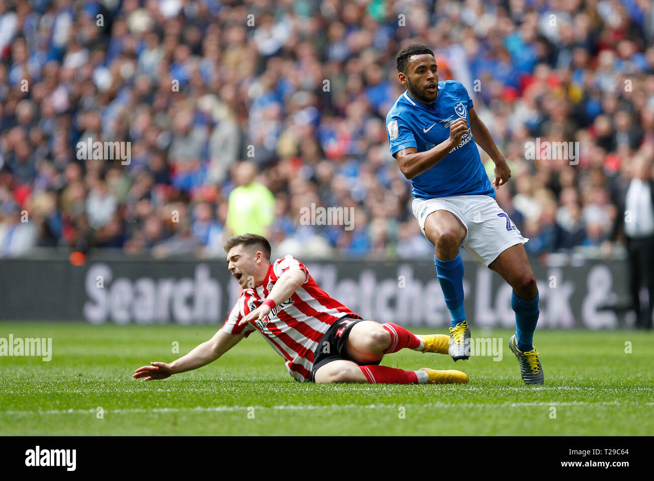 Lynden Gooch of Sunderland goes to ground after a coming together with Nathan Thompson of Portsmouth during the Checkatrade Trophy Final match between Portsmouth and Sunderland at Wembley Stadium, London, England on 31 March 2019. Photo by Carlton Myrie.  Editorial use only, license required for commercial use. No use in betting, games or a single club/league/player publications. Stock Photo