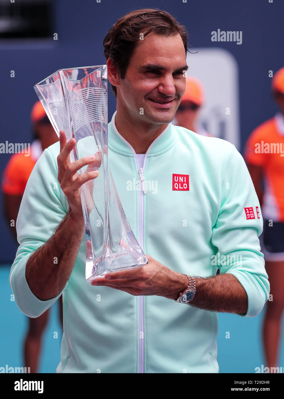 Miami Gardens, Florida, USA. 31st Mar, 2019. Roger Federer, of Switzerland,  poses with the winners trophy during the awards ceremony, after defeating  John Isner, of the United States, in the Men's Final