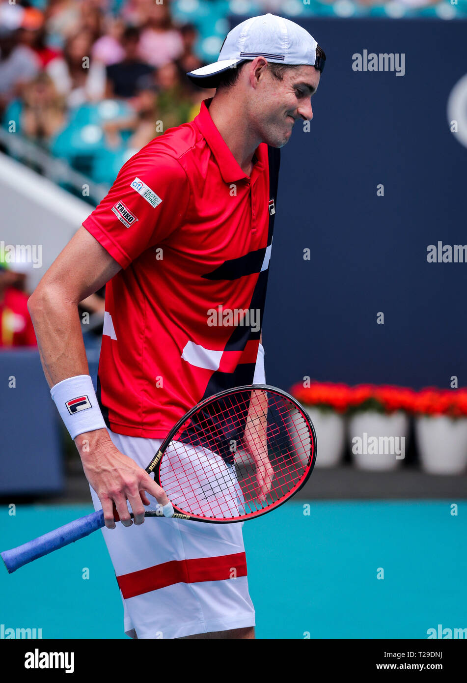 Miami Gardens, Florida, USA. 31st Mar, 2019. John Isner, of the United States, looks in pain during his match against Roger Federer, of Switzerland, in the Men's Singles final of the 2019 Miami Open Presented by Itau professional tennis tournament, played at the Hardrock Stadium in Miami Gardens, Florida, USA. Federer won 6-1, 6-4. Mario Houben/CSM/Alamy Live News Stock Photo