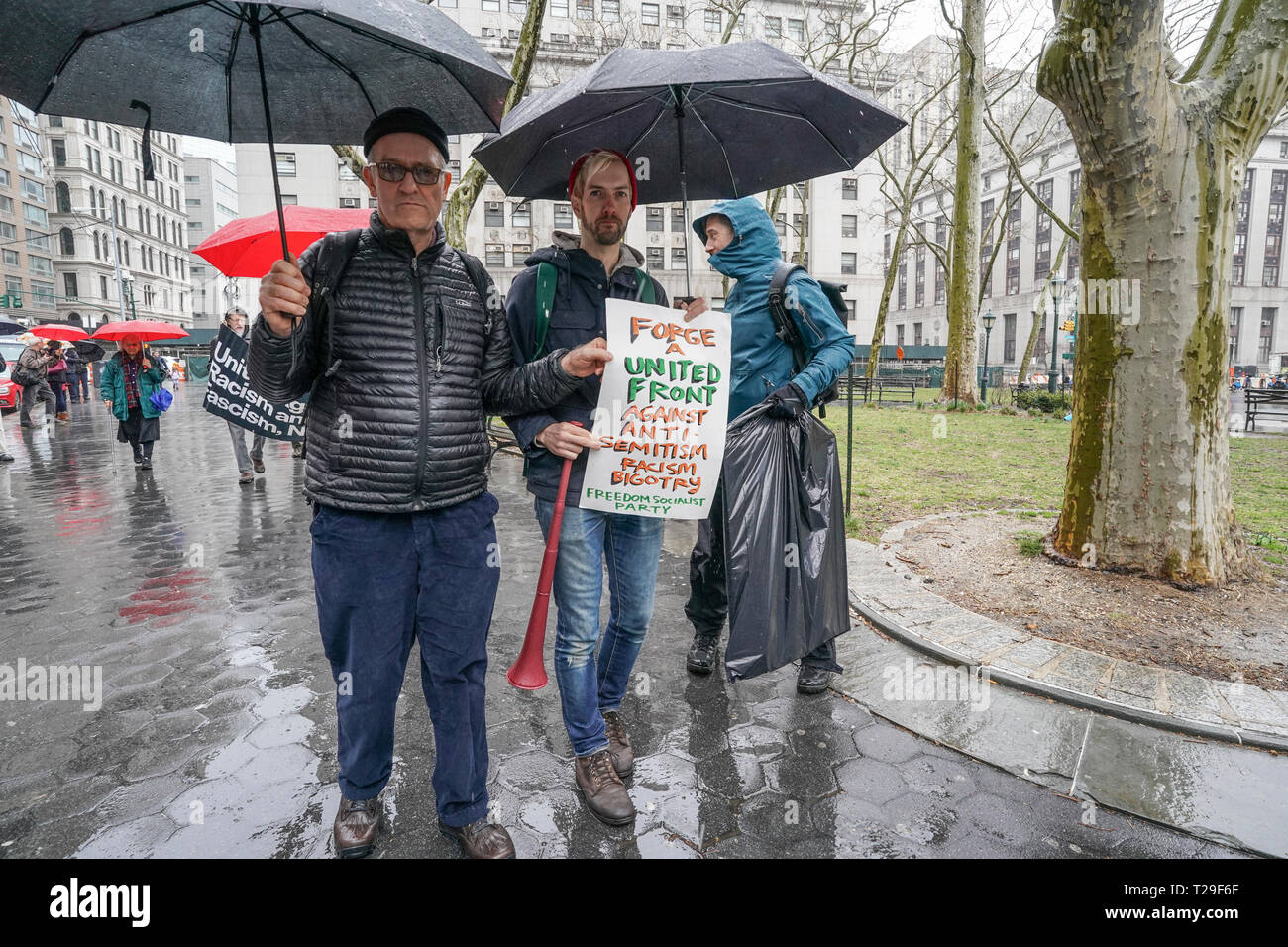 New York, United States. 31st Mar, 2019. New York, NY - March 31, 2019: Rise and Resist members hold rally Against Hate and Holocaust Revisionism as counter protest for rally organized by Polish Americans at Federal Plaza Credit: lev radin/Alamy Live News Stock Photo
