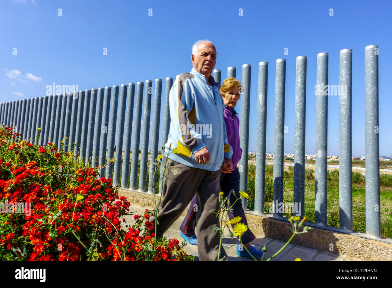 Senior couple, Spanish seniors walking, Valencia, Quart de Poblet district, seniors Spain ageing population Stock Photo