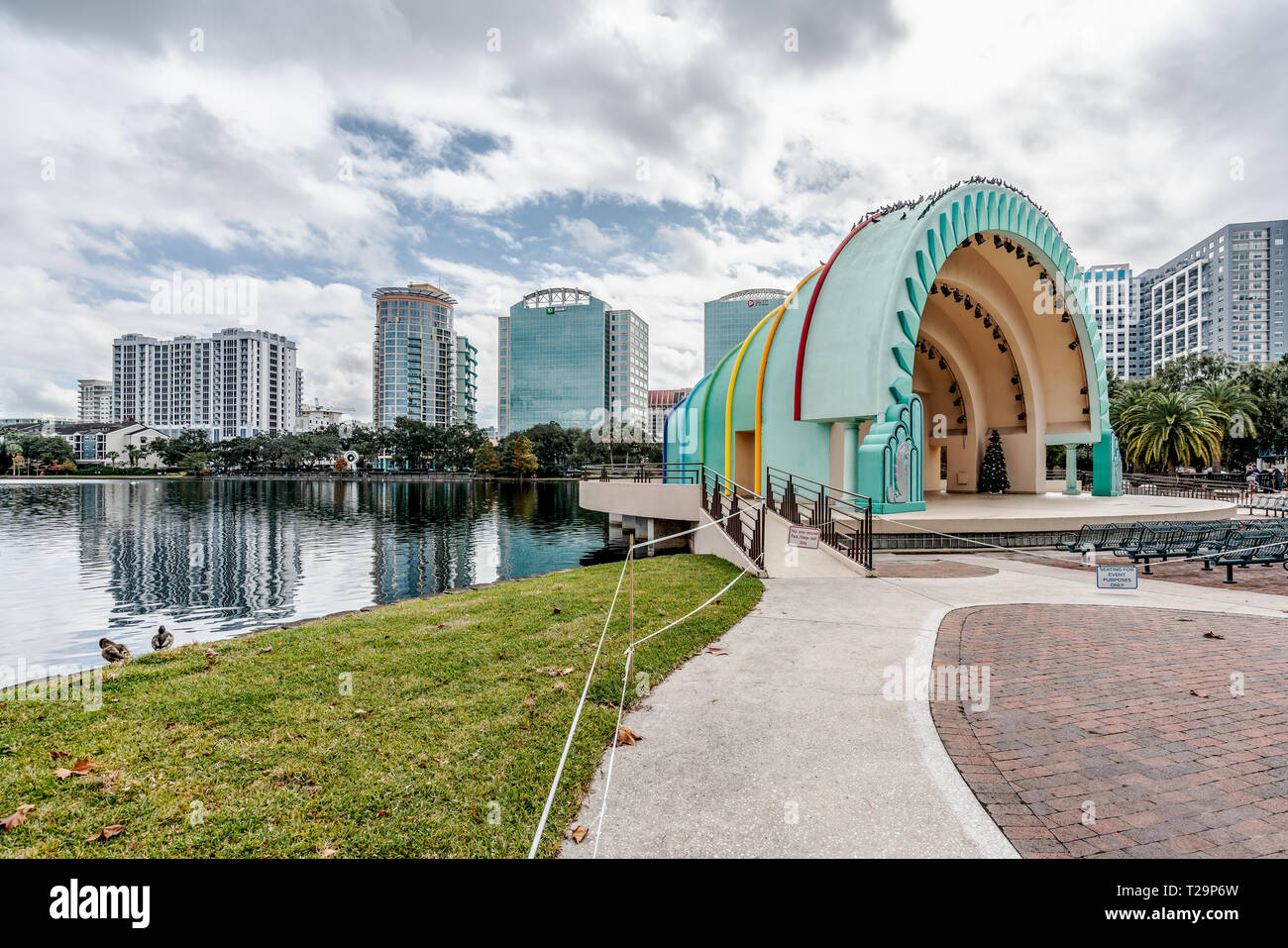 ORLANDO, FLORIDA, USA - DECEMBER, 2018: The rainbow painted amphitheater in remembrance of the victims who died in the Pulse tragedy, at Eola Park, Do Stock Photo
