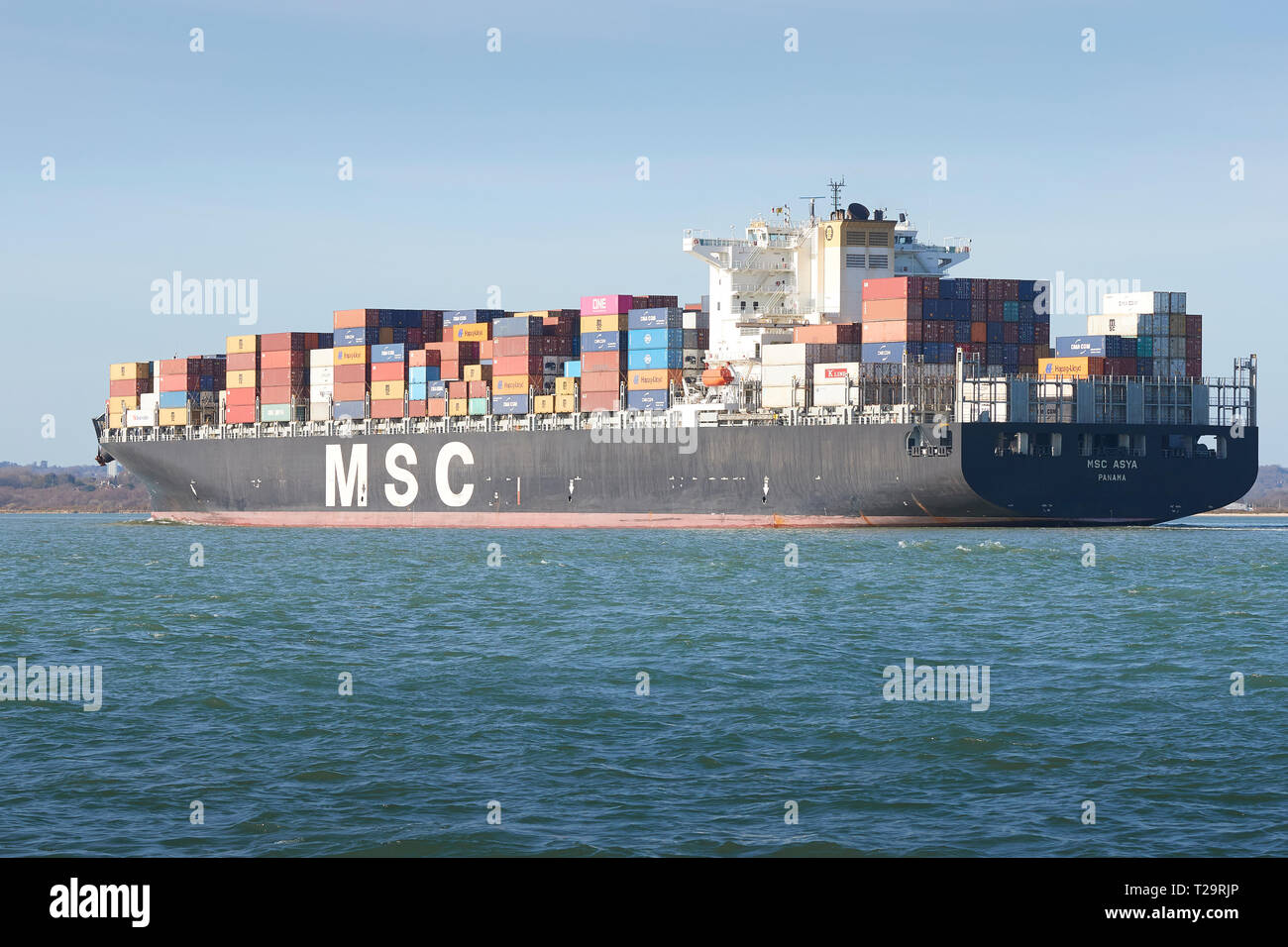 The Container Ship, MSC ASYA, Underway In The Deep Water Channel As She Approaches The Port Of Southampton, UK. 25 March 2019. Stock Photo