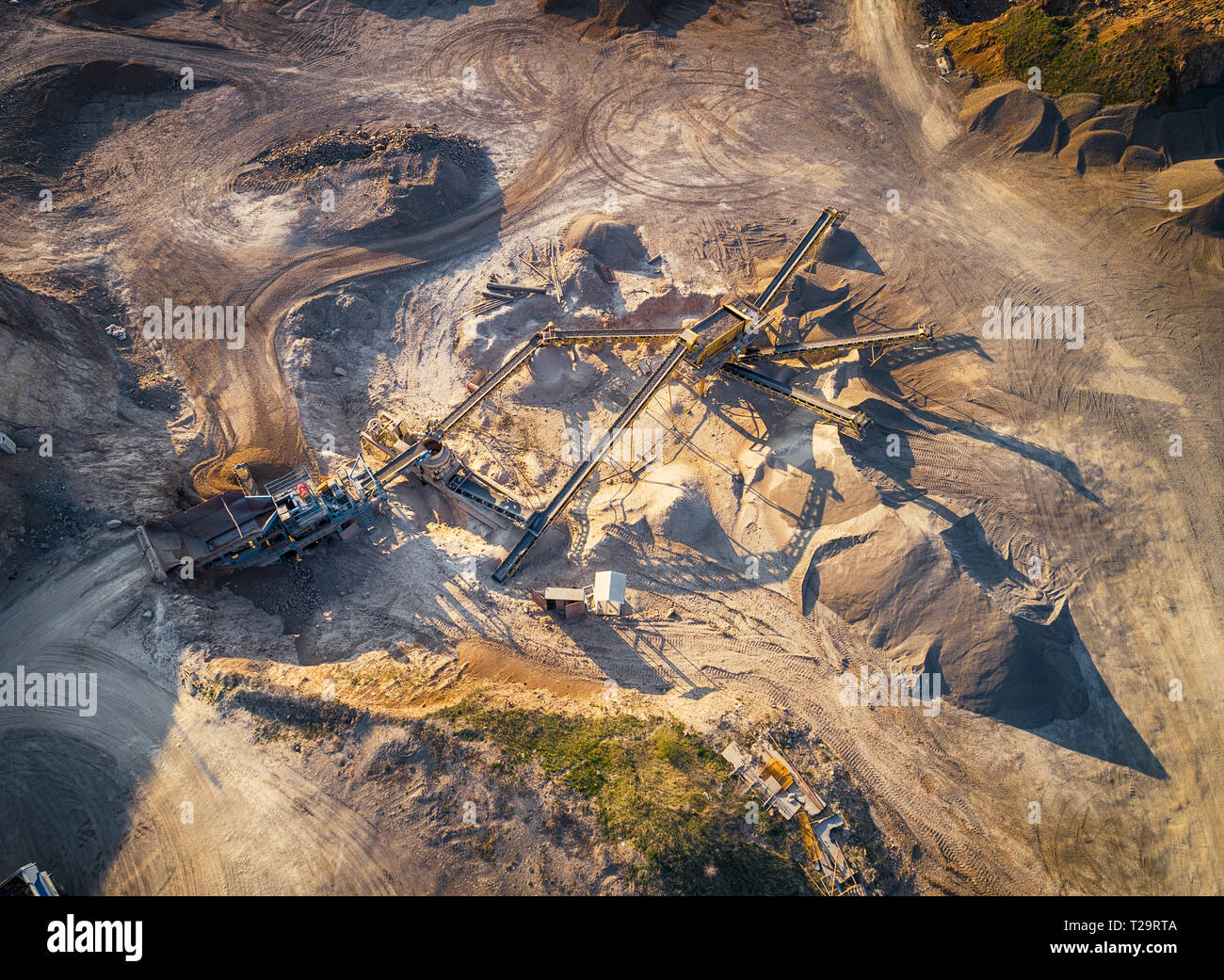 Panoramic view at sunset of gravel quarry,mining of yellow construction ...