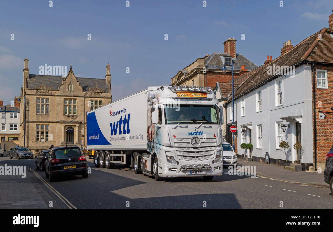 Devizes, Wiltshire, England, UK. March 2019. Learner driver on a transport training course using a artic lorry in Devizes town centre. Stock Photo