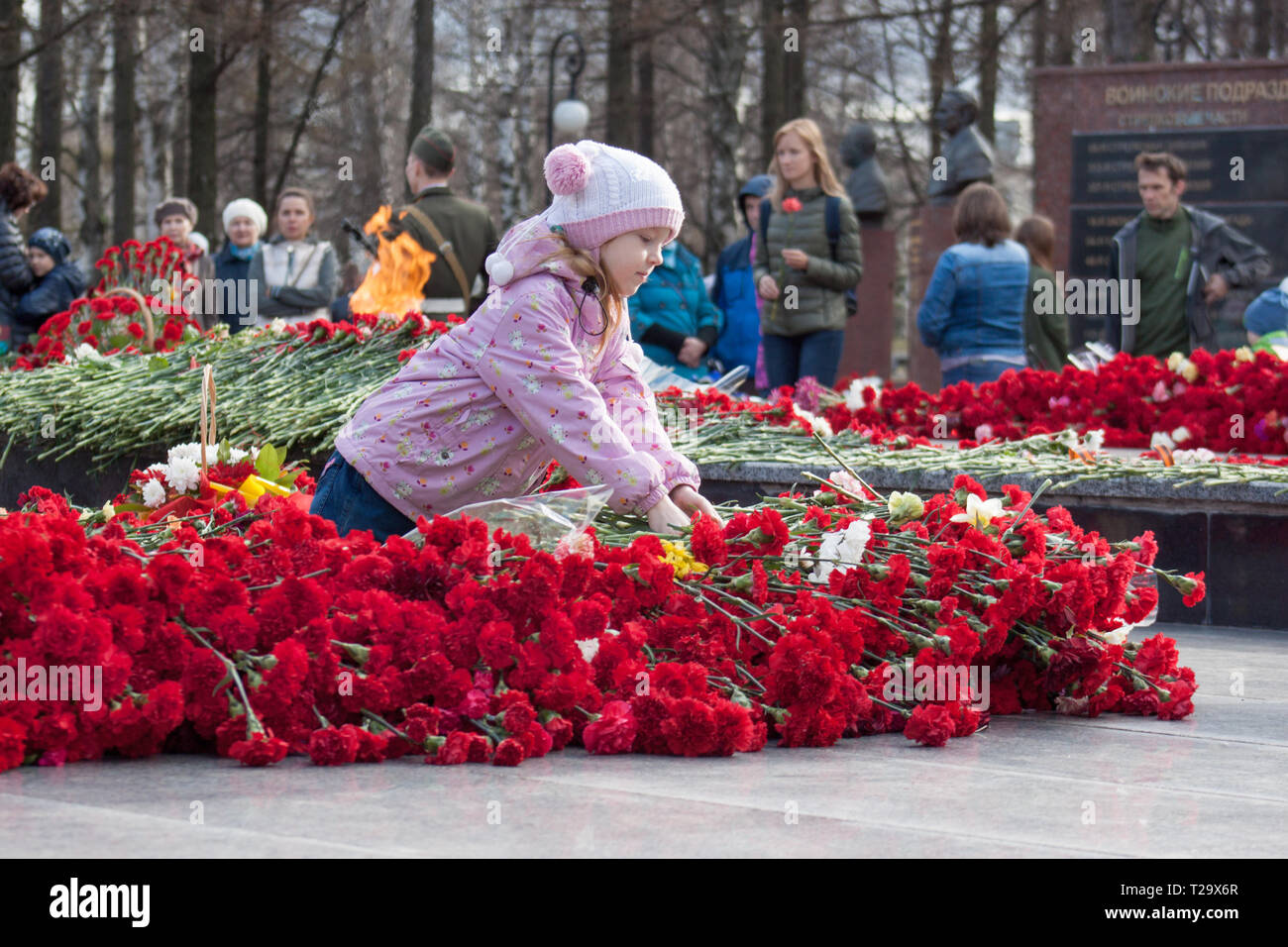 Russia, Izhevsk May 9, 2018 The girl is laying flowers at the