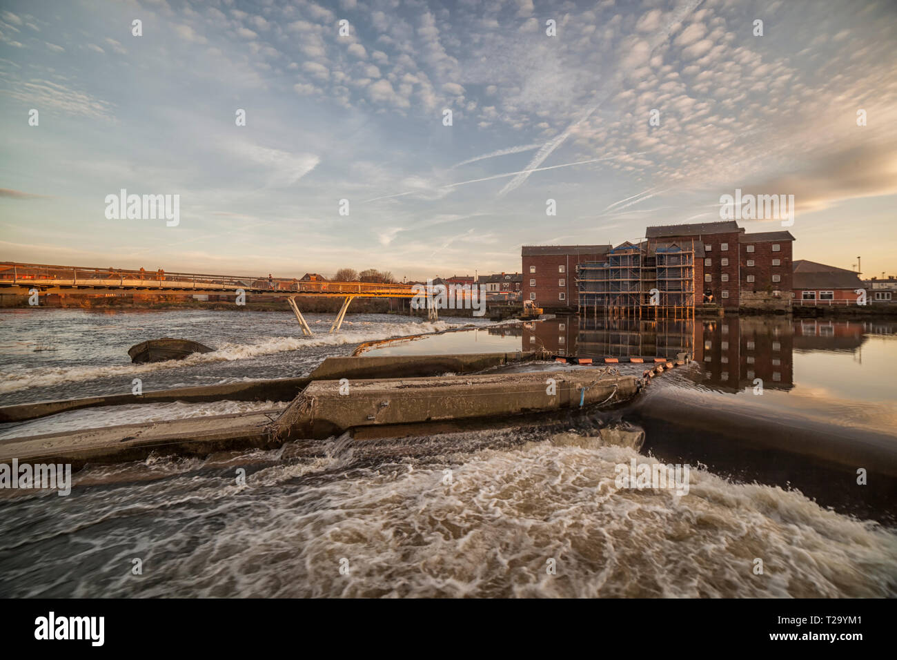 Castleford footbridge and flour mill at sunset Stock Photo