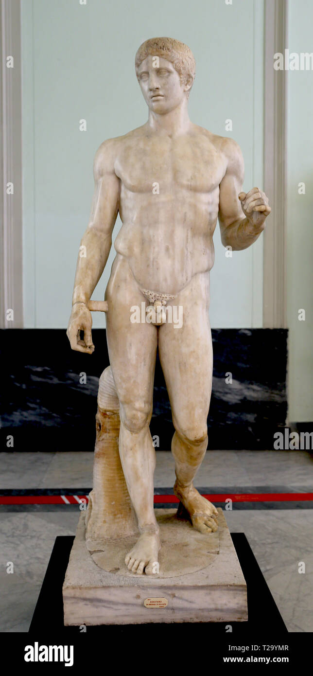 Statue of Doryphoros (young spear-bearer). 1st century AD. Samnite Palestra of Pompeii. Marble. Roman copy. Naples. Stock Photo