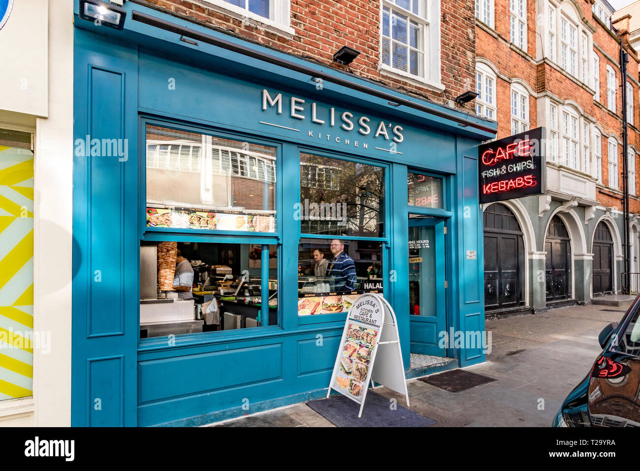 Melissa's Kitchen on Elizabeth Street ,a cafe selling a variety of food including kebabs fish and chips and English breakfasts Belgaravia ,London, UK Stock Photo