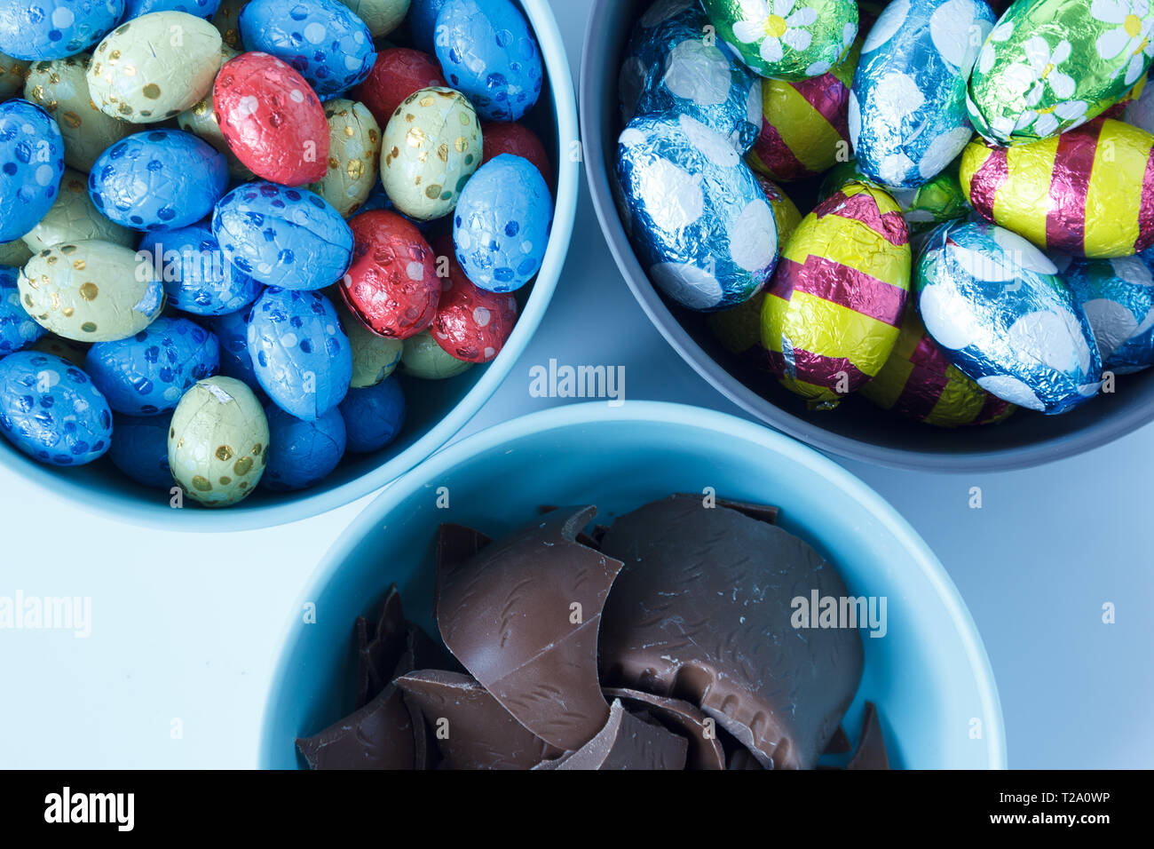 Chocolate easter eggs and pieces of a chocolate easter bunny Stock Photo