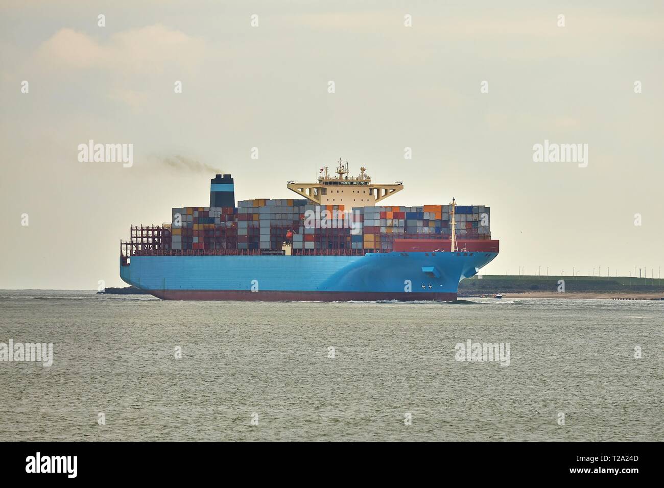 Huge Container Ship in the Port of Rotterdam Stock Photo