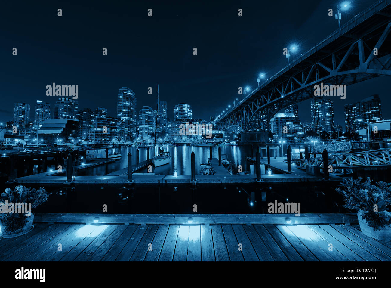 Vancouver False Creek at night with bridge and boat Stock Photo - Alamy