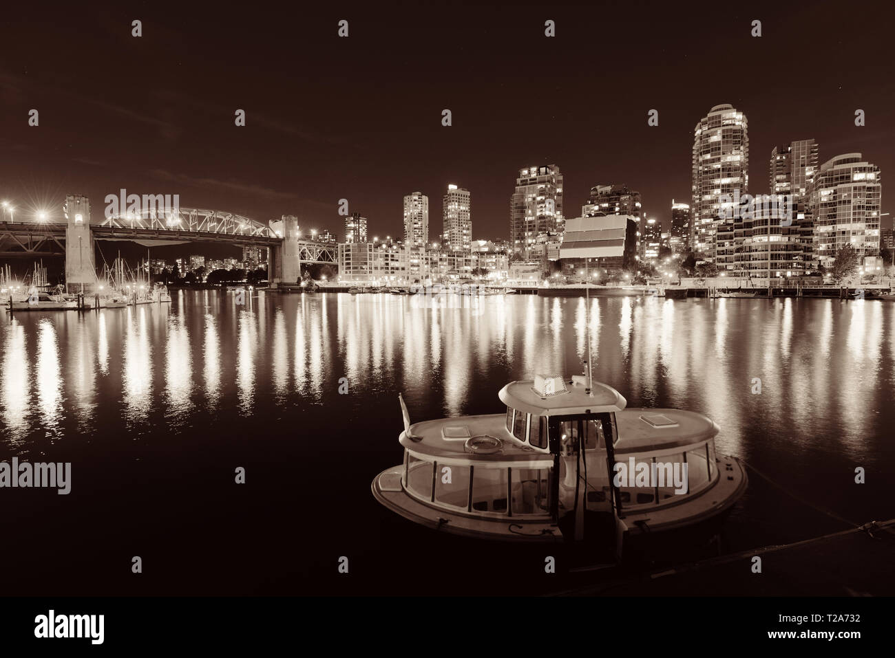 Vancouver False Creek at night with bridge and boat Stock Photo - Alamy