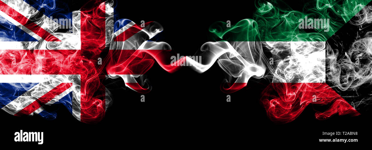 United Kingdom vs Kuwait, Kuwaiti smoky mystic flags placed side by side. Thick colored silky smoke flags of Great Britain and Kuwait, Kuwaiti. Stock Photo