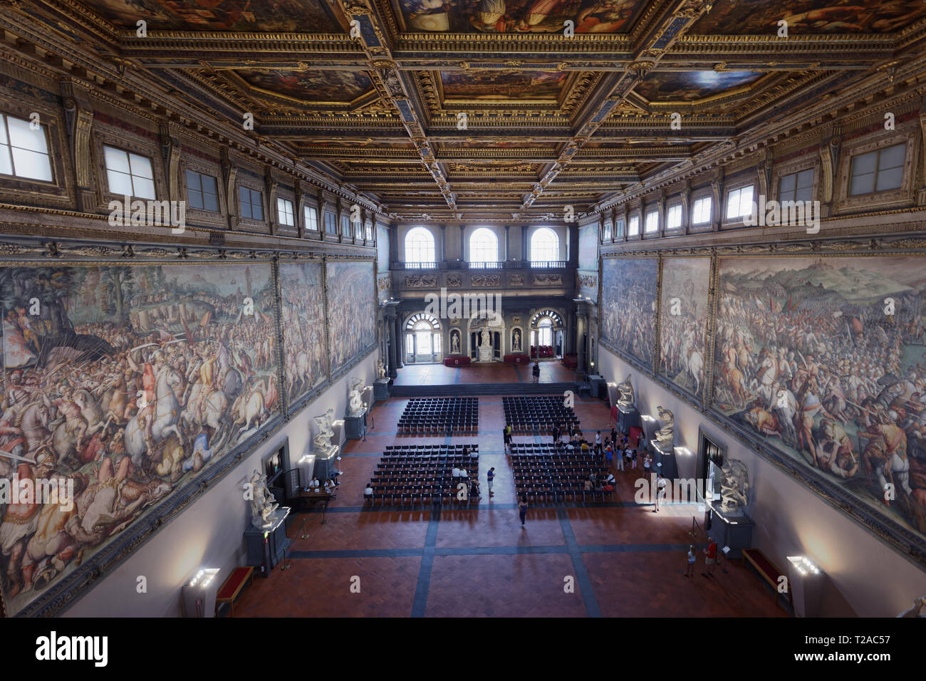 Florence, Italy - August 10, 2018: People in the Hall of the Five Hundred, Salone dei Cinquecento in Palazzo Vecchio. It is the largest room in Italy  Stock Photo