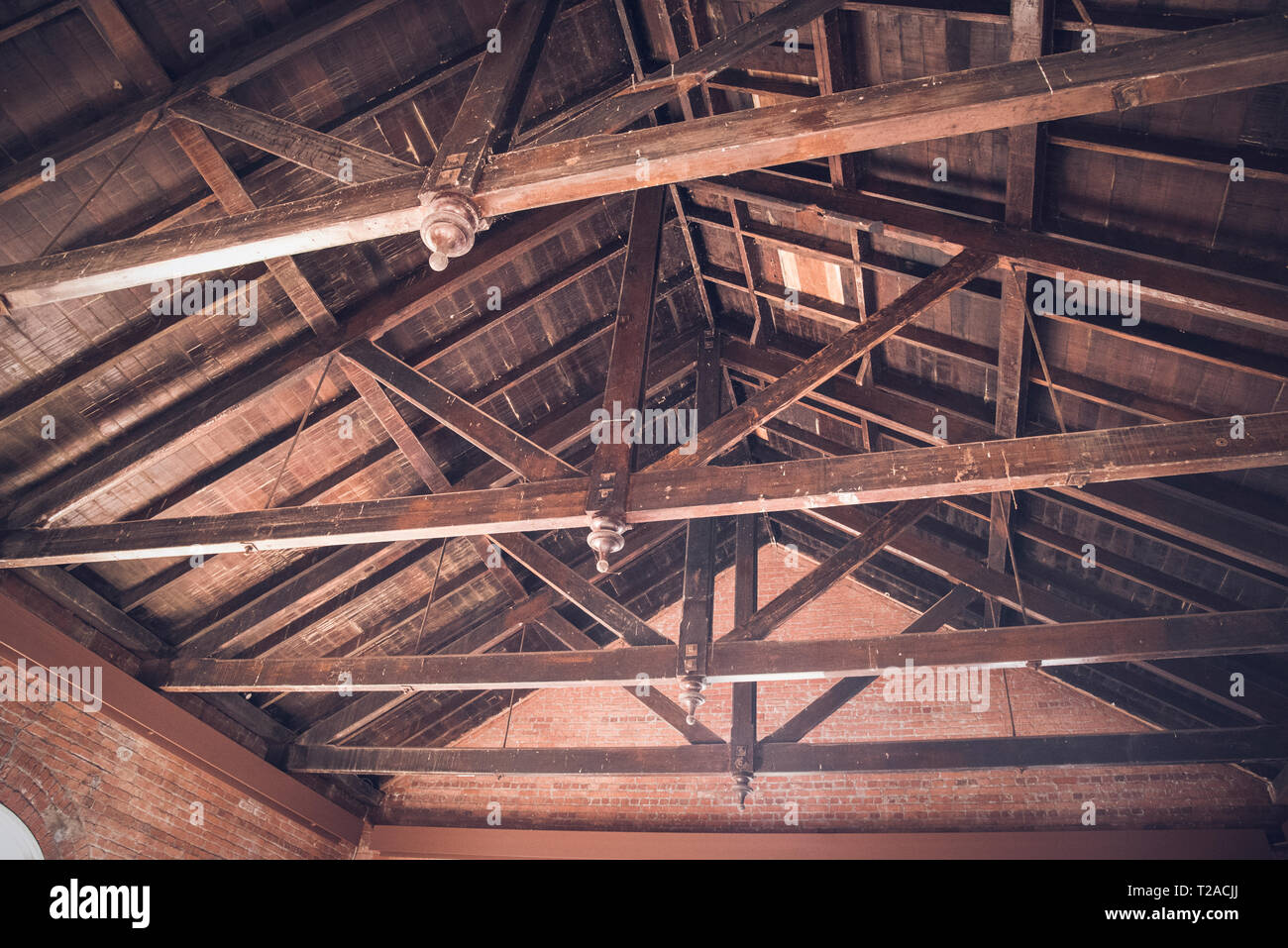 Interior side of roof showing support structure and cross beams. Stock Photo