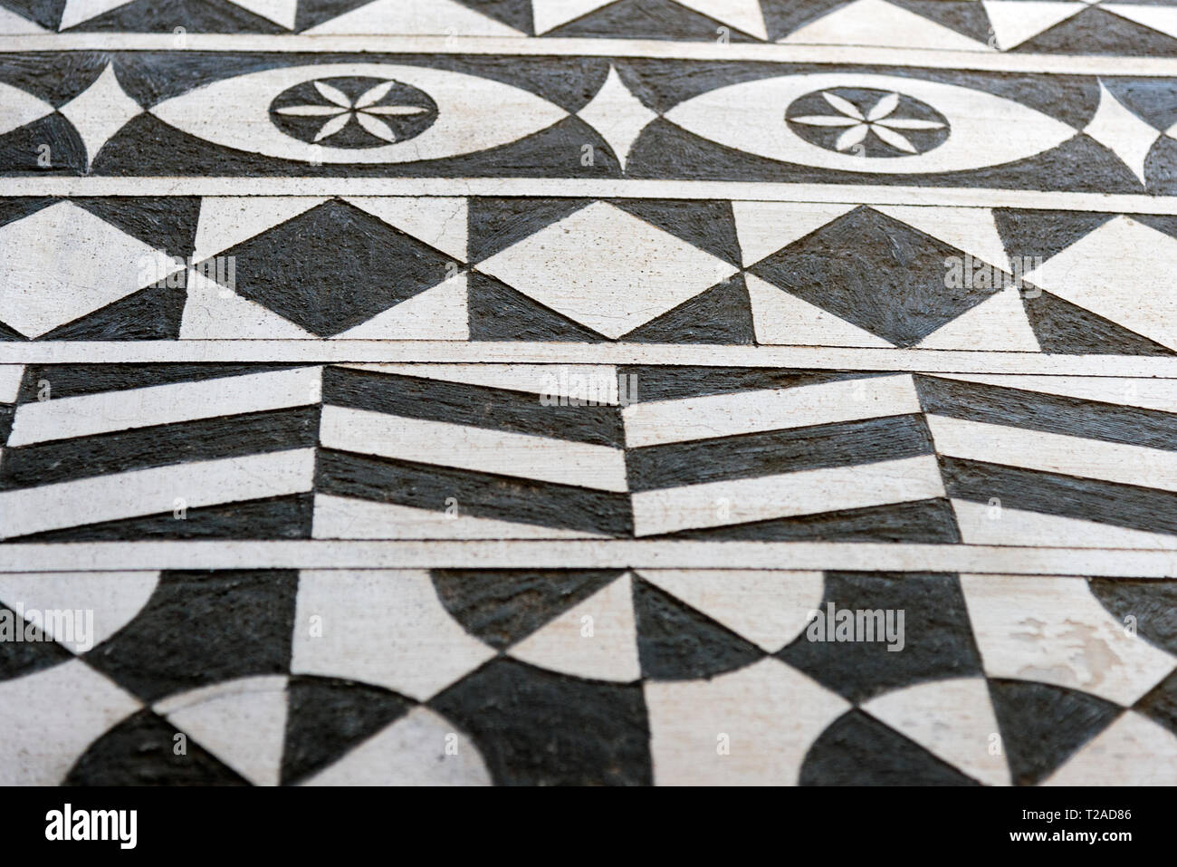 Geometrical patterns decorations on the buildings from Chios Island Pyrgi Region. Stock Photo