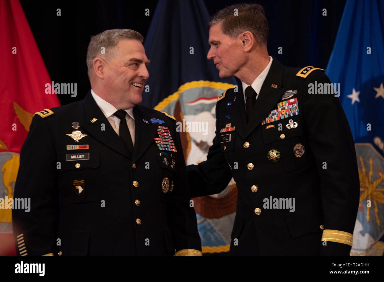 U.S. Army Chief of Staff Gen. Mark A. Milley, left, with outgoing commander of U.S. Central Command, General Joseph L. Votel, during his retirement ceremony at Macdill Air Force Base March 29, 2019 in Tampa, Florida. Votel retired after 39 years of military service. Stock Photo