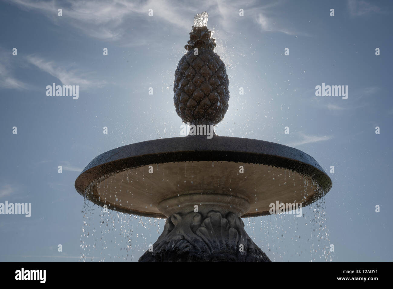 A fully functioning and operational concrete outdoor water fountain in