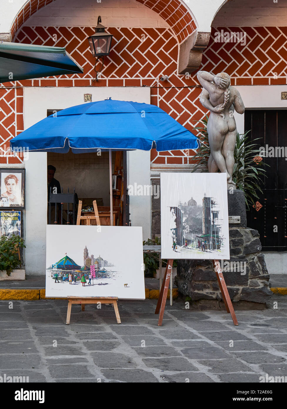 Workshop of Mexican painter with his exhibition paintings in Mexican Artist Quarter of Puebla, Barrio Del Artista, Calle 8 Norte, Mexico Stock Photo