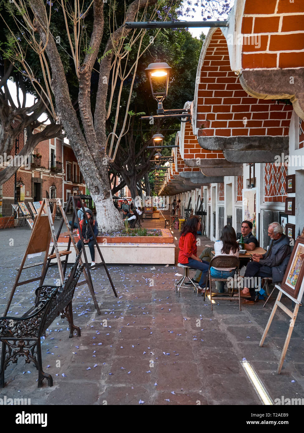 Old street with artists, workshops and paintings in Mexican Artist Quarter,  Barrio Del Artista, Calle 8 Norte, Puebla, Mexico Stock Photo