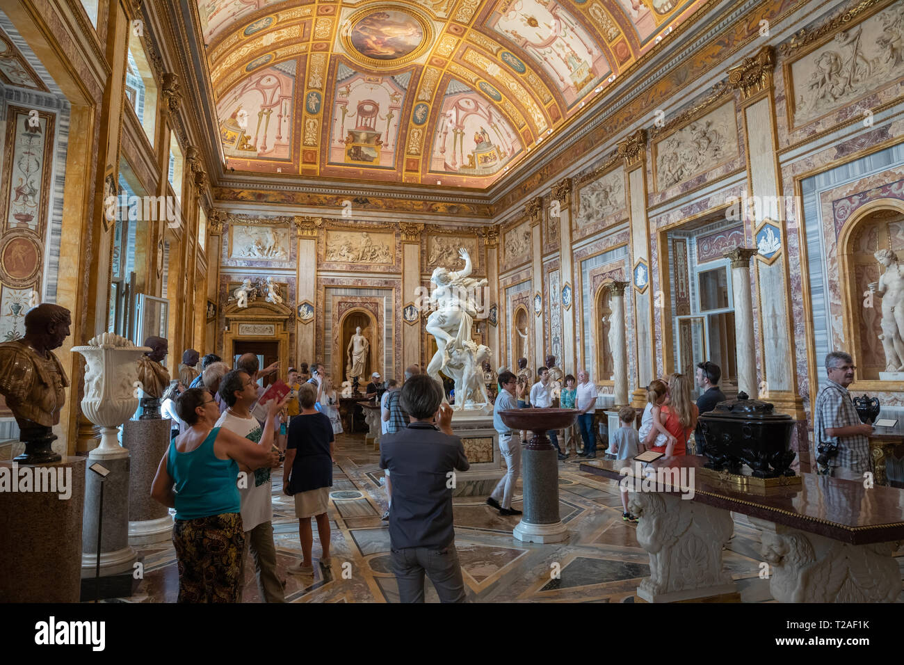 Rome, Italy - June 22, 2018: Baroque marble sculptural group by Italian artist in Galleria Borghese of Villa Borghese Stock Photo