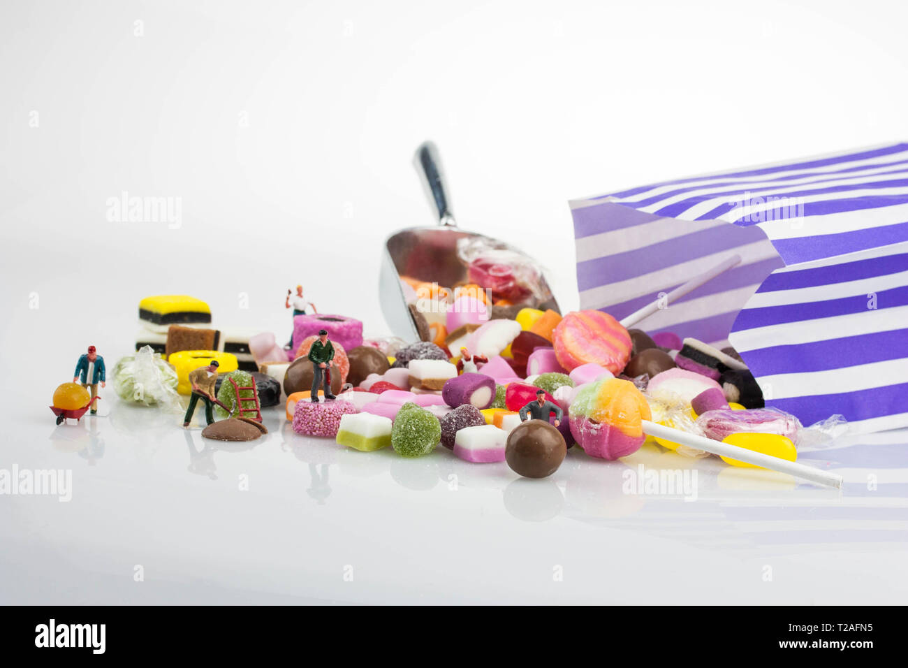 Miniature people - Sweet selection Stock Photo