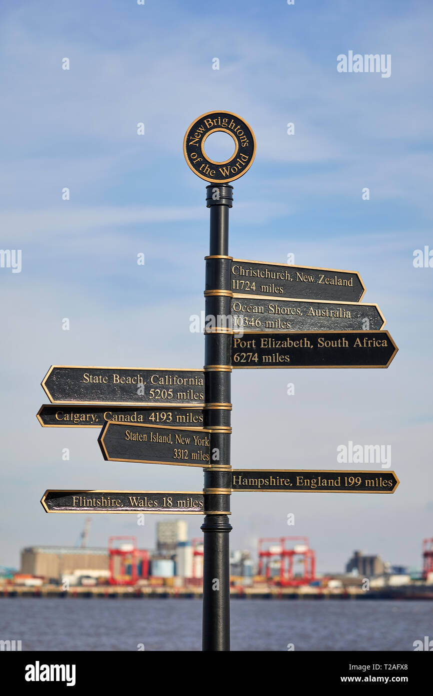 New Brighton seaside resort  Wallasey, Wirral, Merseyside, England.   Tourist miles destination sign post for New Brightons around the world Stock Photo