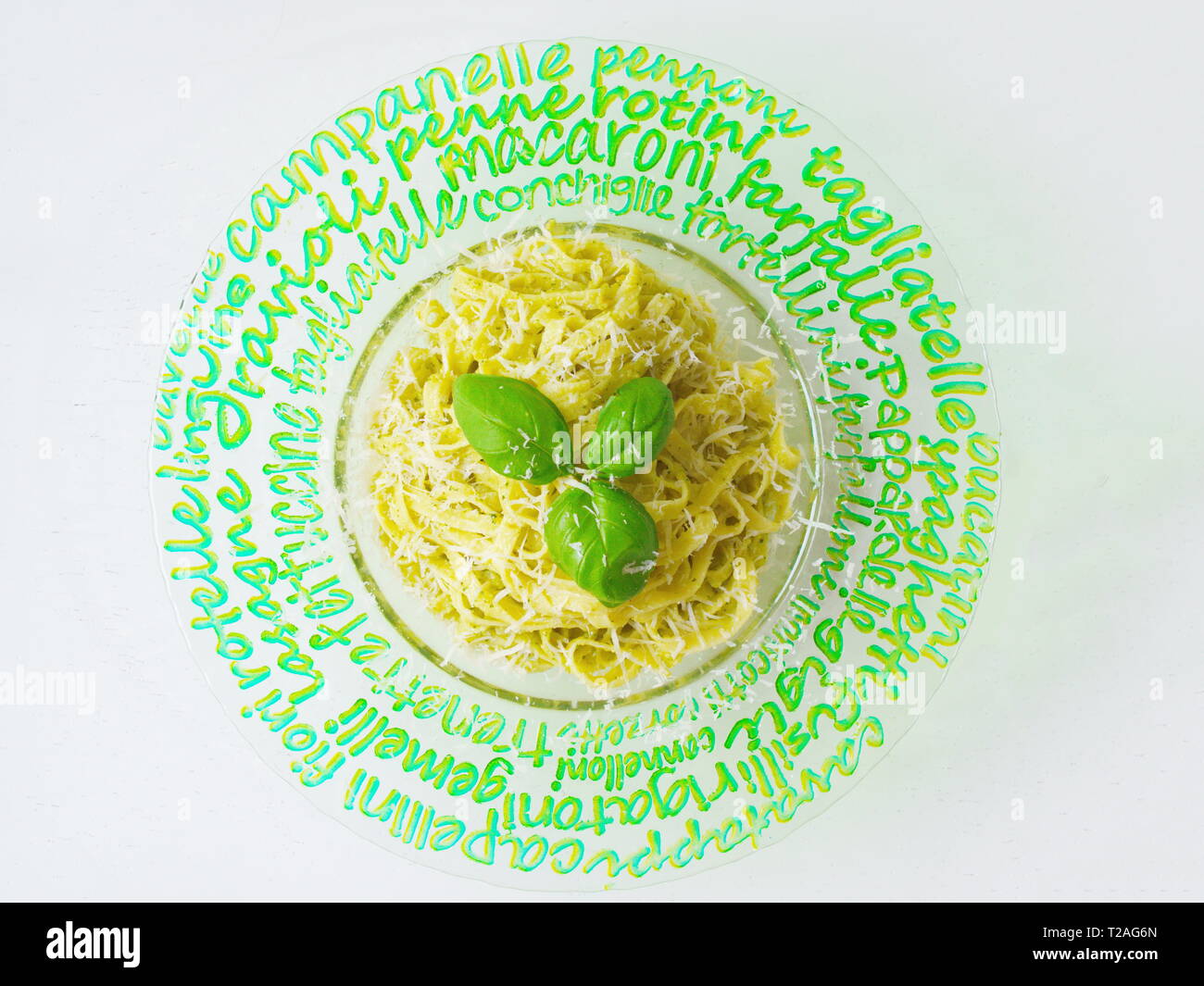 Fettuccine pasta. basil, pistachio, parmesan cheese, creamy pasta. It