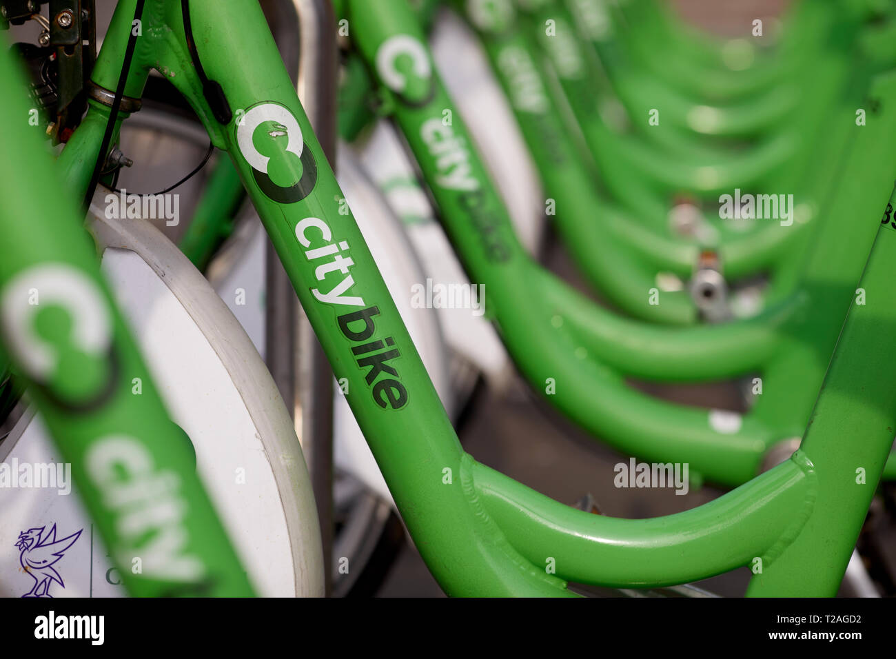 Liverpool's citybike cycle hire scheme stored in a pavement docking station hub Stock Photo