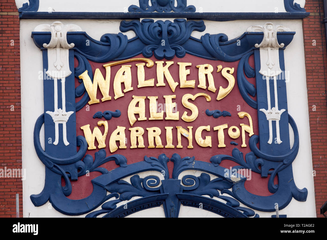 Liverpool, Walkers Ales Warrington sign on pub exterior Stock Photo