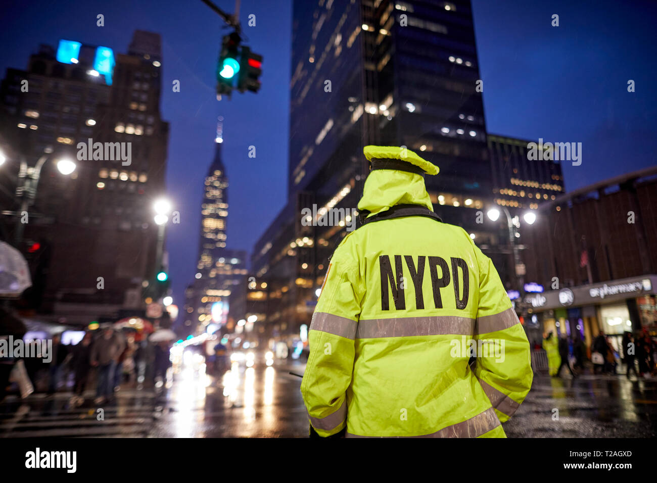 New York Manhattan NYPD traffic office in the rain on 8th Avenue USA Stock Photo